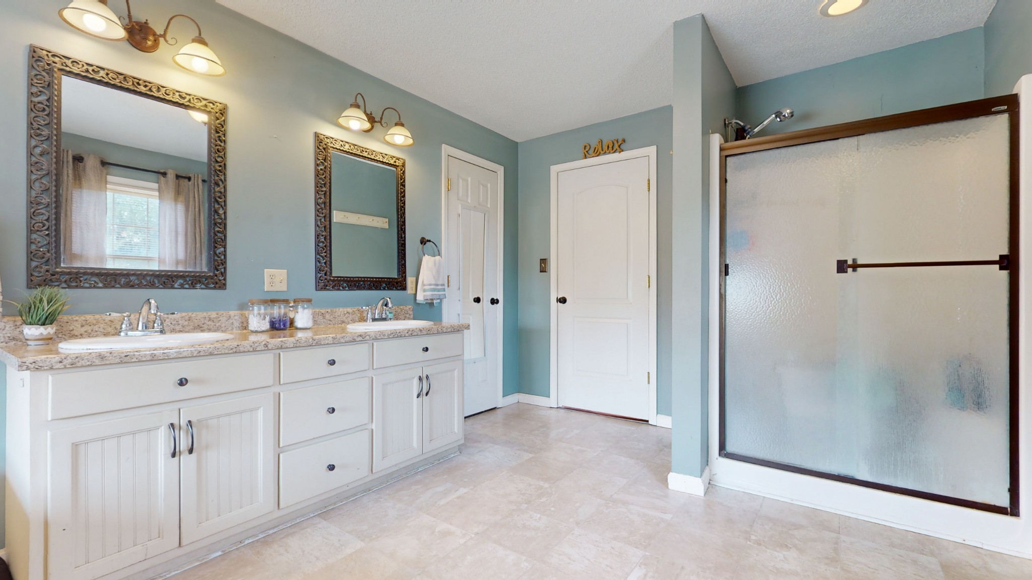 511 Limestone Road Elora, TN 37328 - Photo 31 of 55 a bathroom with a double vanity sink mirror and double