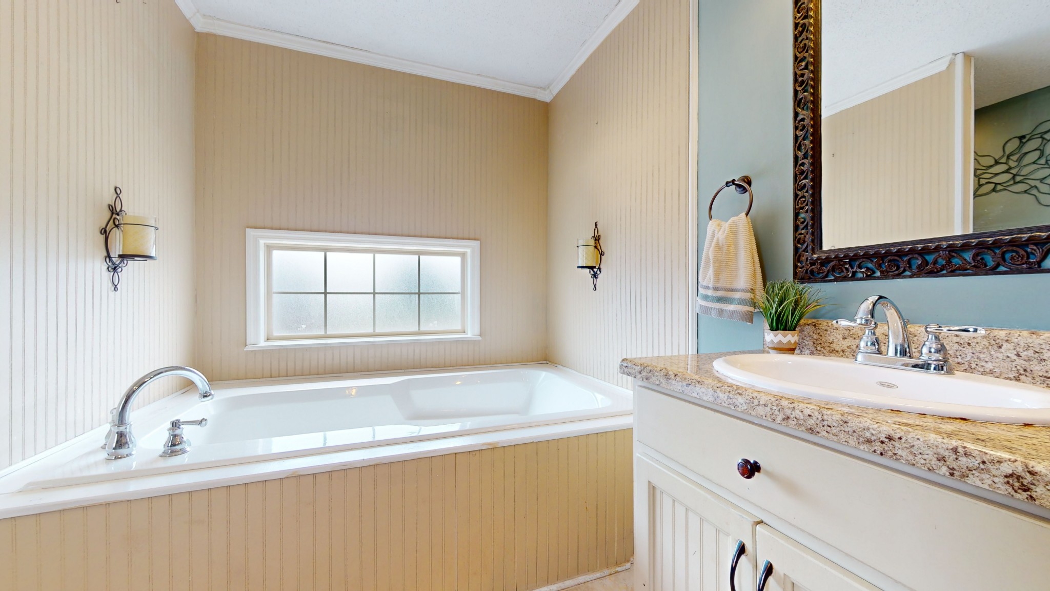 511 Limestone Road Elora, TN 37328 - Photo 32 of 55 a bathroom with a granite countertop sink and a mirror
