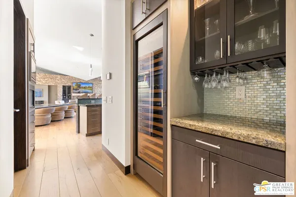 a bed room with a bed and a large window