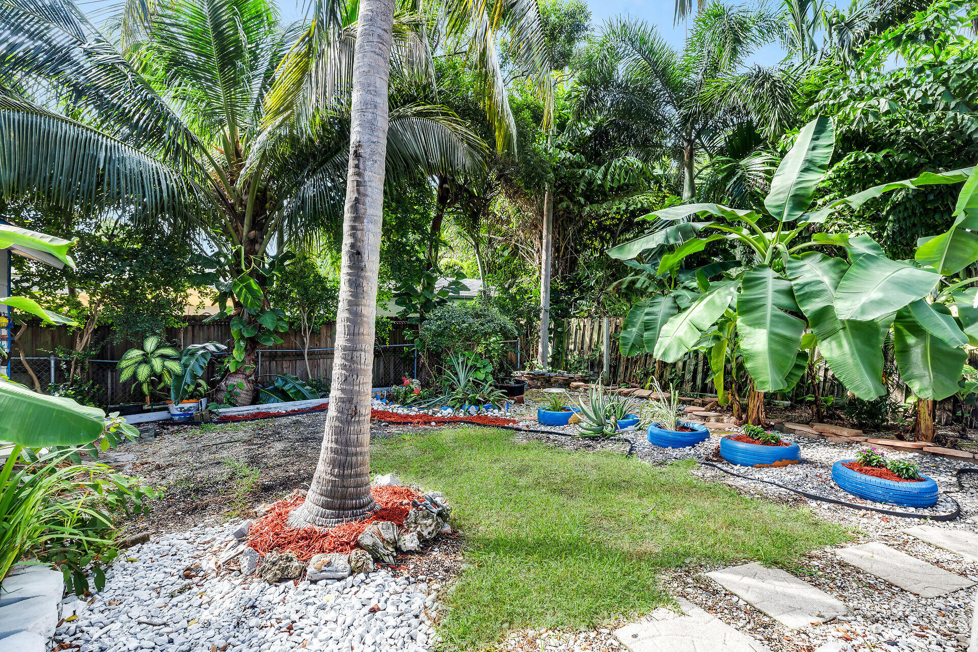13 Bass Avenue Key Largo, FL 33037 - Photo 34 of 43 a view of a park with large trees and plants