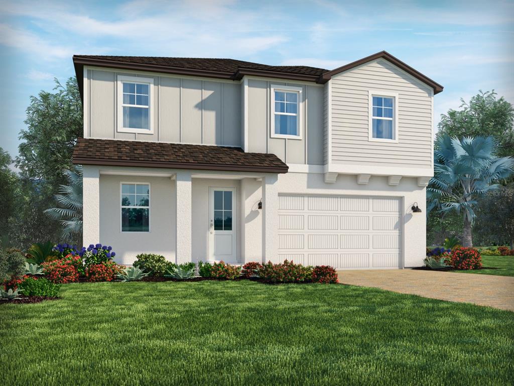 2248 Hen Road Minneola, FL 34715 - Photo 1 of 1 a front view of a house with a yard and garage