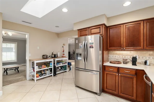 a bathroom with a sink mirror and vanity