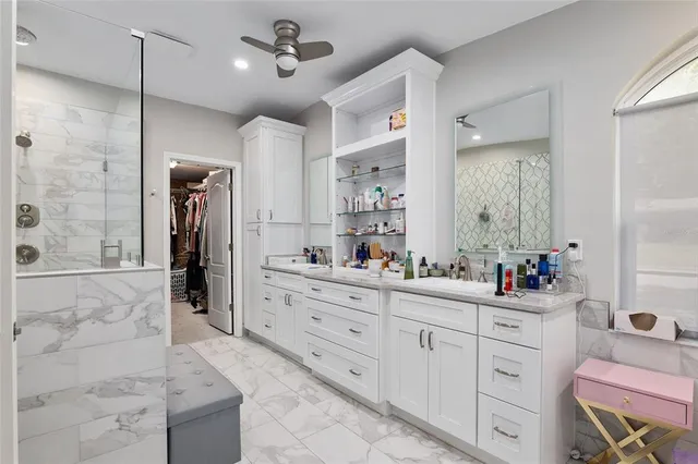 a bedroom with bed and window