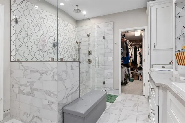 a view of a backyard with a swimming pool