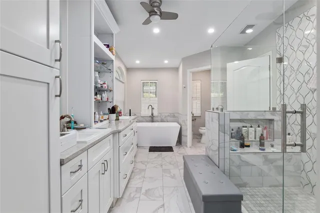 a view of a backyard with a wooden deck