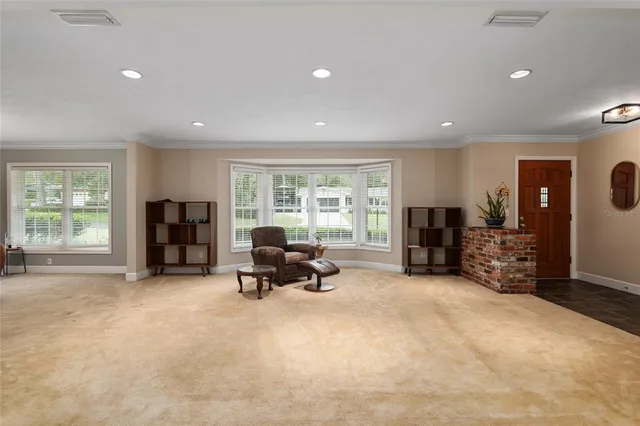 a living room with furniture flat screen tv and a fireplace