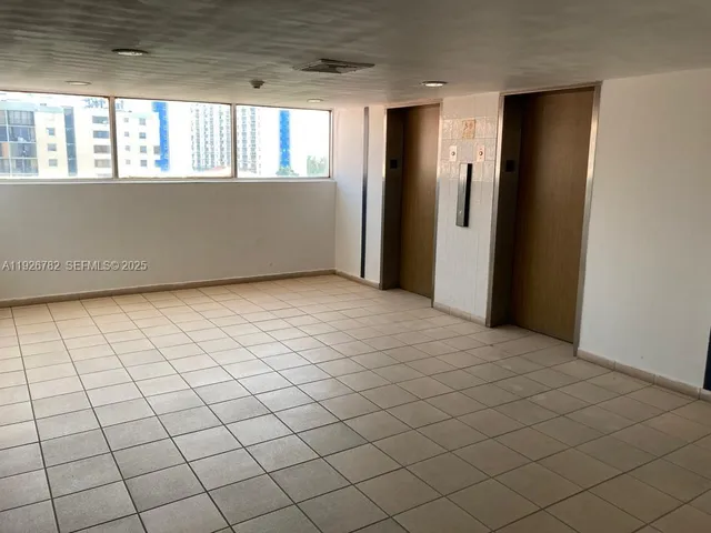 a kitchen with a stove and a microwave