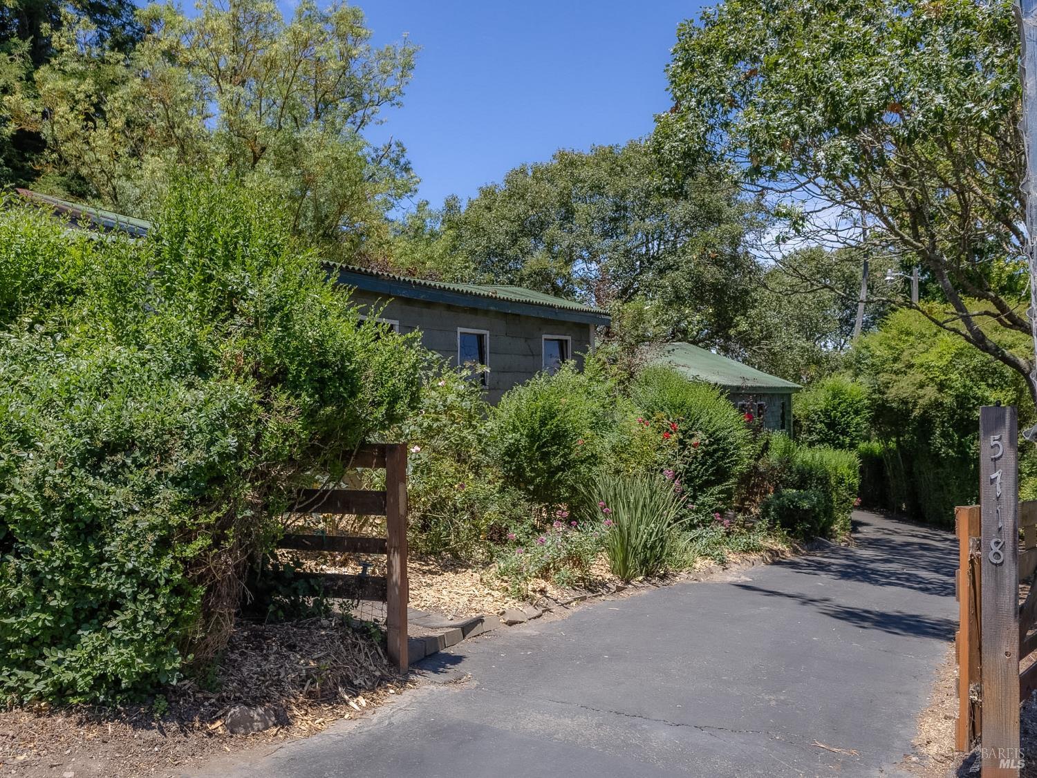 5718 Henning Road Sebastopol, CA 95472 - Photo 2 of 32 Welcome to 5718 Henning Road, driveway entrance past barns