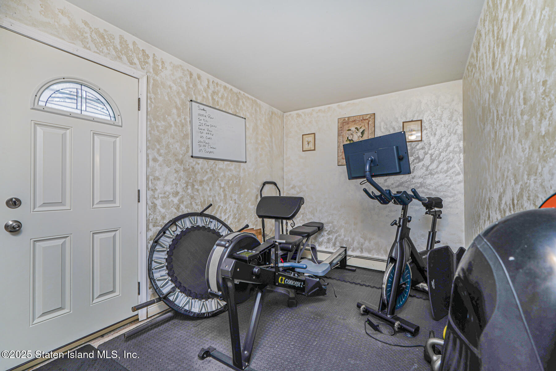 121 Clark Lane Staten Island, NY 10304 - Photo 17 of 18 a view of a workspace with furniture and a window