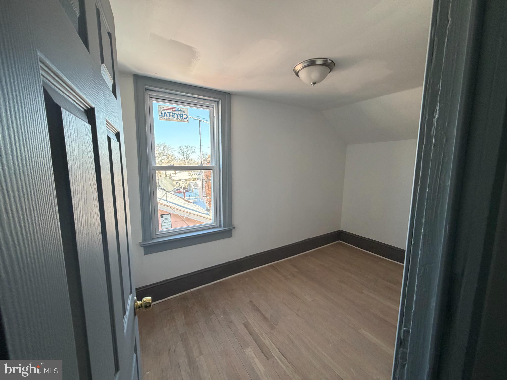 1410 Pennington Road Trenton, NJ 08618 - Photo 7 of 15 a view of an empty room with a window