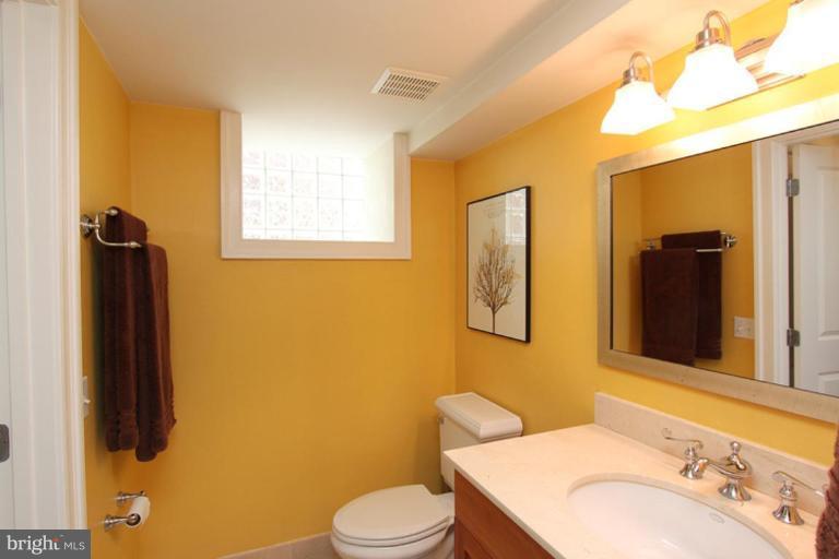 1750 16th Street Northwest, Unit 4 Washington, DC 20009 - Photo 10 of 20 a bathroom with a sink toilet and shower