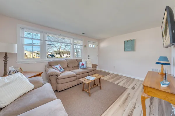 a living room with furniture and a couch