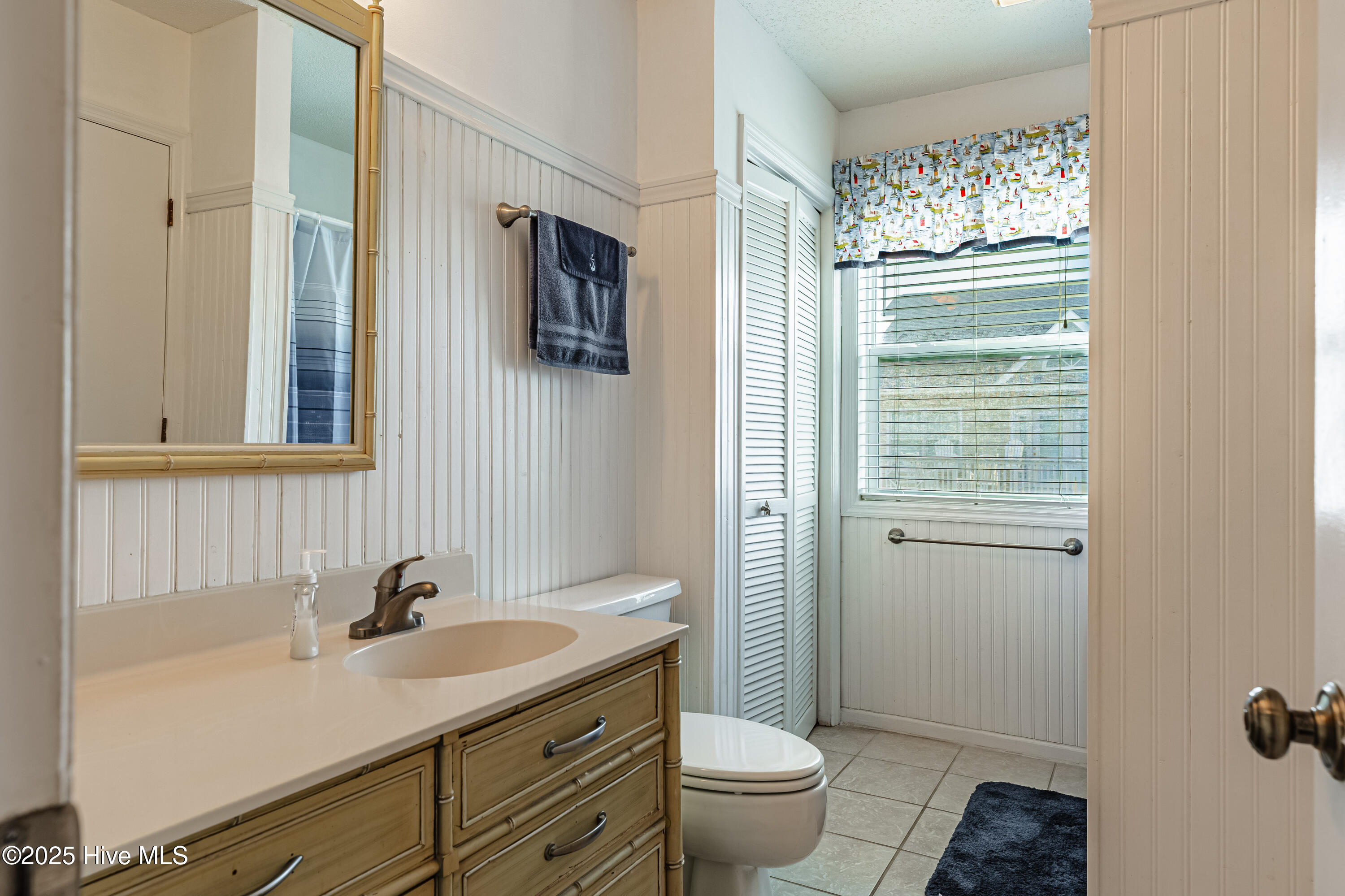 4 Seabrook Road, Unit 1 Ocean Isle Beach, NC 28469 - Photo 13 of 37 Bath/Laundry