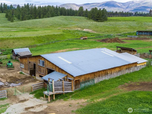 a aerial view of a house with a yard
