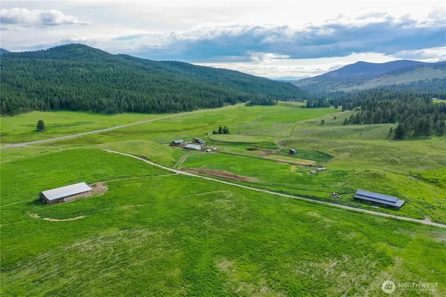 a view of a field with a big yard