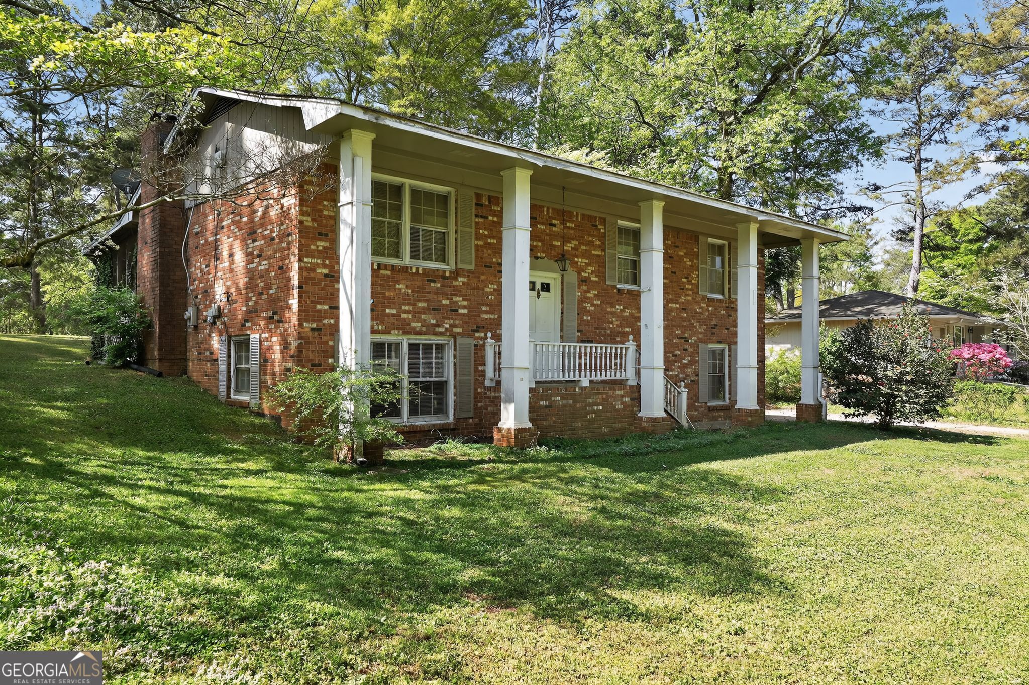 1071 Luther Drive Southwest Mableton, GA 30126 - Photo 2 of 27 a view of a house with backyard and garden