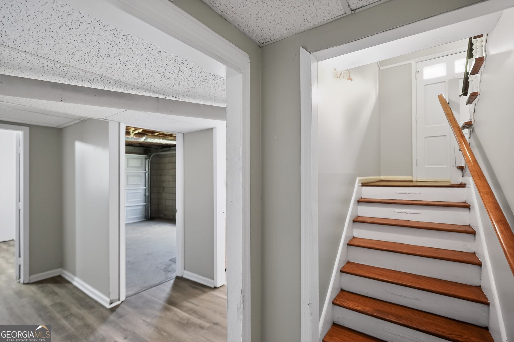 1071 Luther Drive Southwest Mableton, GA 30126 - Photo 23 of 27 a view of entryway with stairs and wooden floor