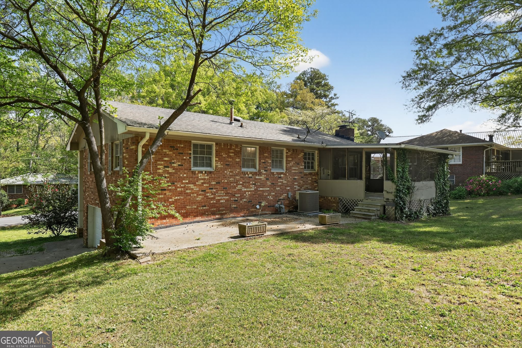 1071 Luther Drive Southwest Mableton, GA 30126 - Photo 26 of 27 a backyard of a house with seating space