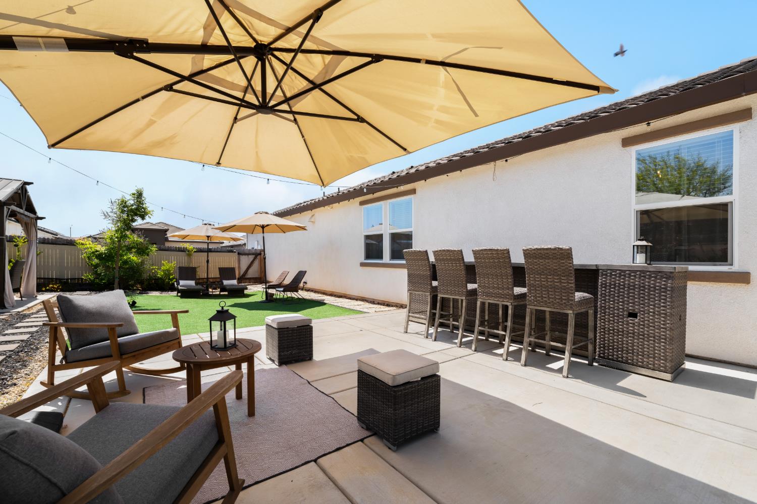 4216 Creede Way Rancho Cordova, CA 95742 - Photo 43 of 56 Rear yard umbrella, bar area