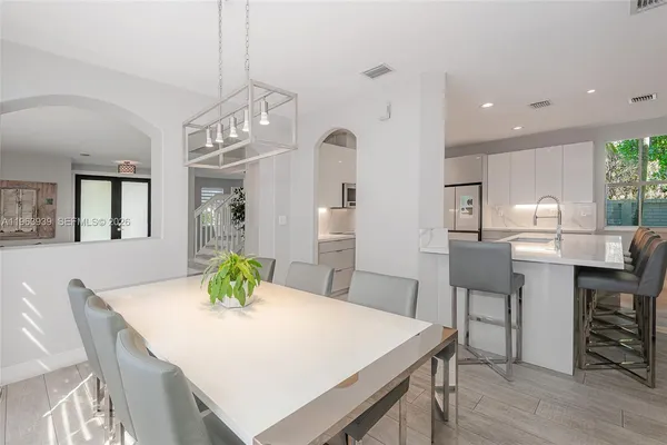 a view of a dining room with furniture