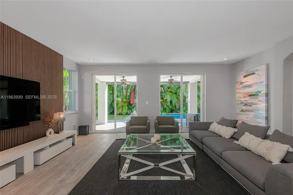 a bedroom with a bed and a table in it