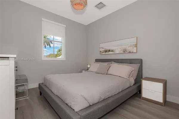 a view of swimming pool with a patio and a yard