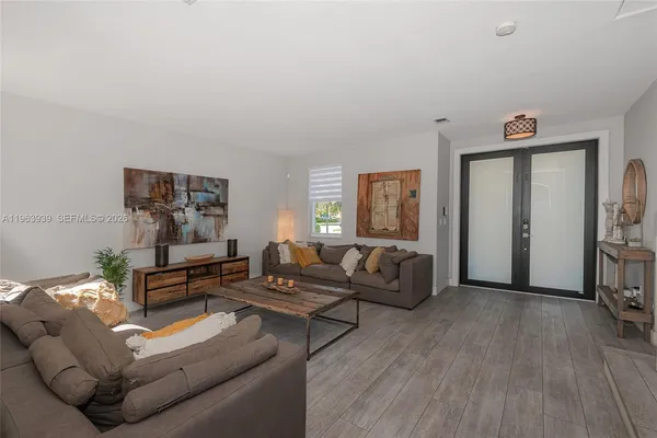 a view of a dining room with furniture window and outside view