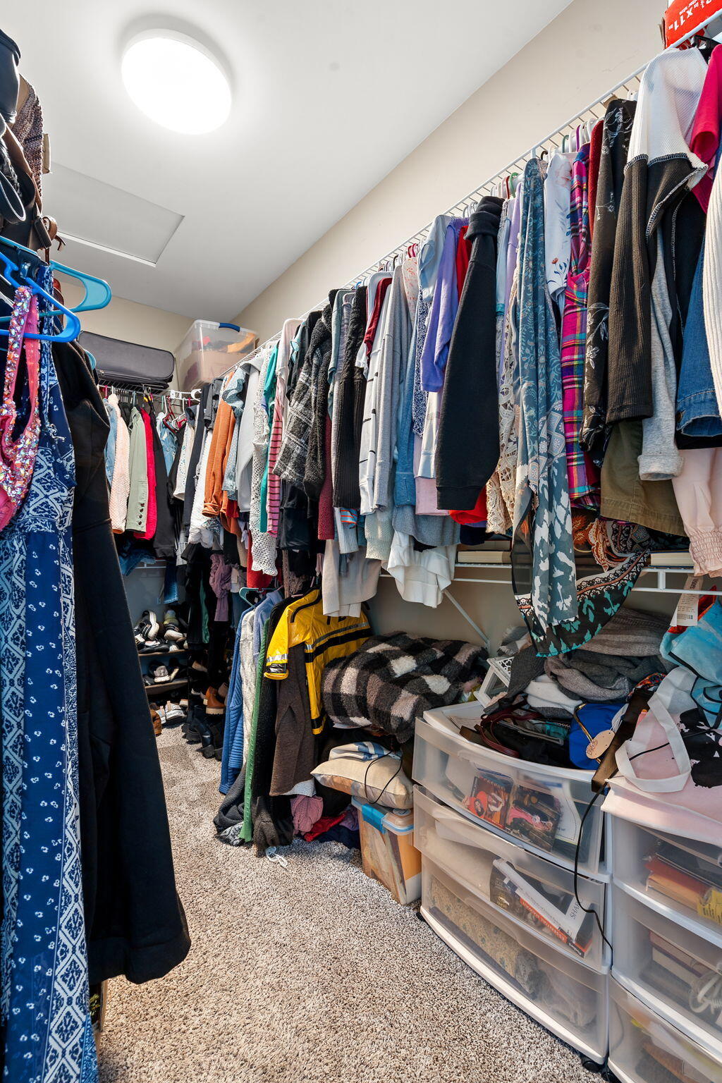 1171 Weaver Way Chesterton, IN 46304 - Photo 14 of 25 a view of walk in closet with clothes and shoes