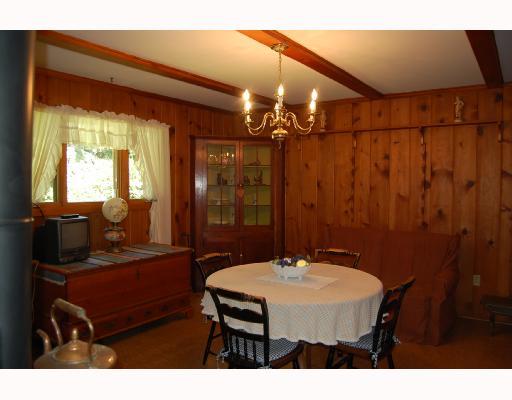 341 Rolshouse Road Pittsburgh, PA 15237 - Photo 3 of 8 Dining Room. BEAMED CEILING, KNOTTY PINE, BRASS LIGHTING & CORNER CHINA CLOSET ADD CHARACTER TO THE DINING ROOM