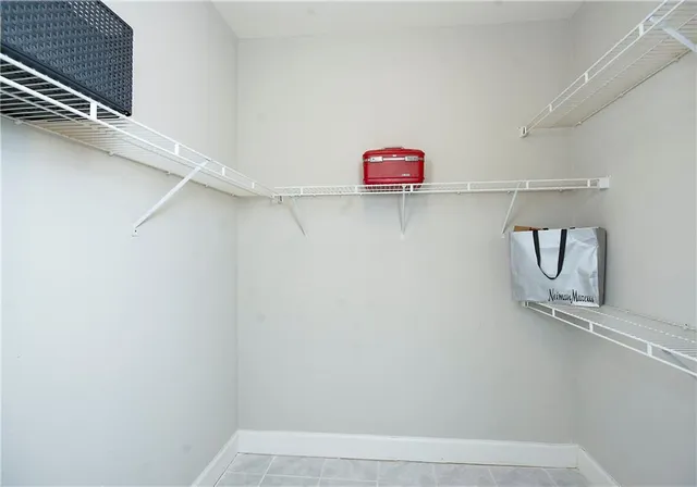 a view of an empty walk in closet