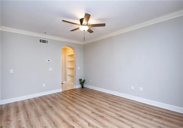a white bath tub sitting in a bathroom