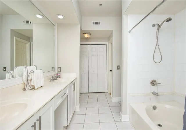 a bathroom with a sink a vanity and a mirror
