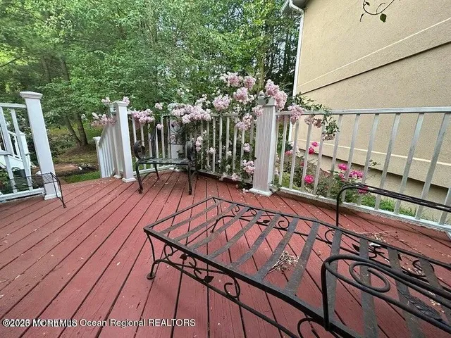 a view of a lake with houses in the back