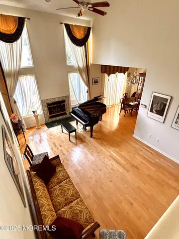 a view of a dining room with furniture and chandelier