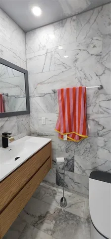 a bathroom with a sink and a shower