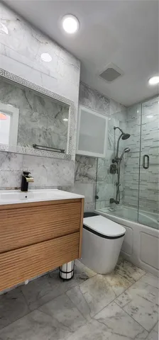 a bathroom with a toilet and a sink