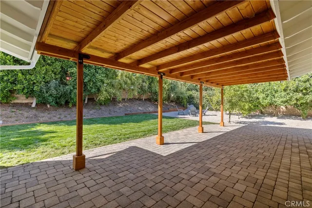 a view of a backyard with porch