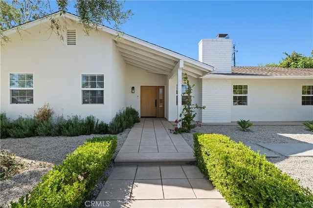 a view of a house with garden