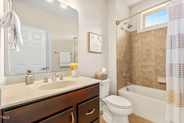 a bathroom with a sink a toilet and a bathtub