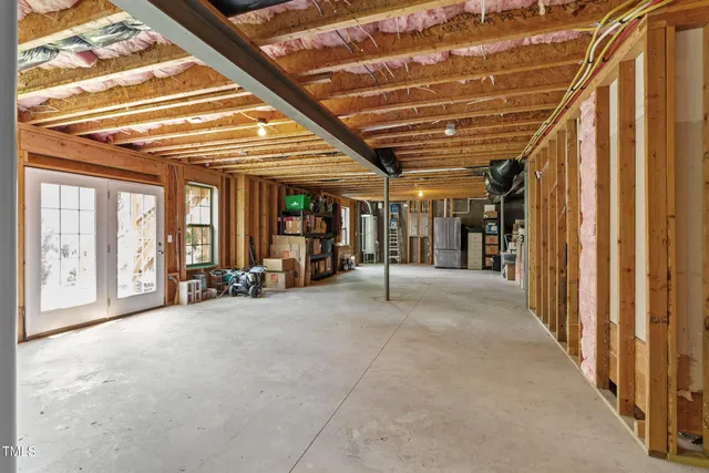 a view of a hallway with seating area