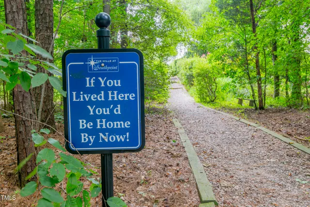 a sign on the side of the road