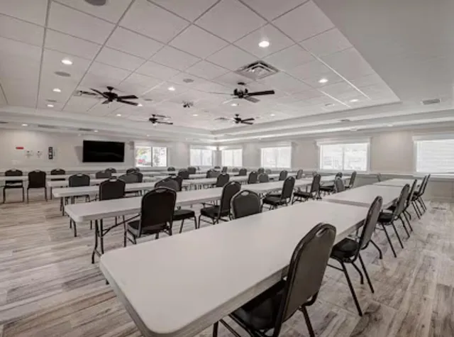 a very nice looking living room with furniture and a flat screen tv