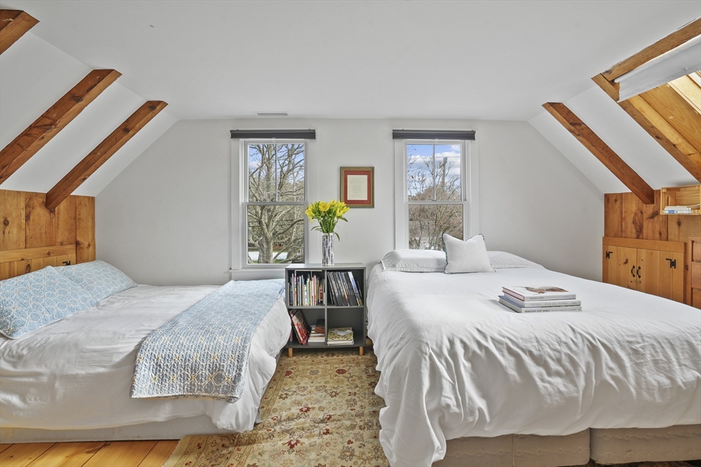44 Planting Field Way Edgartown, MA 02539 - Photo 20 of 33 a bedroom with a bed and dresser