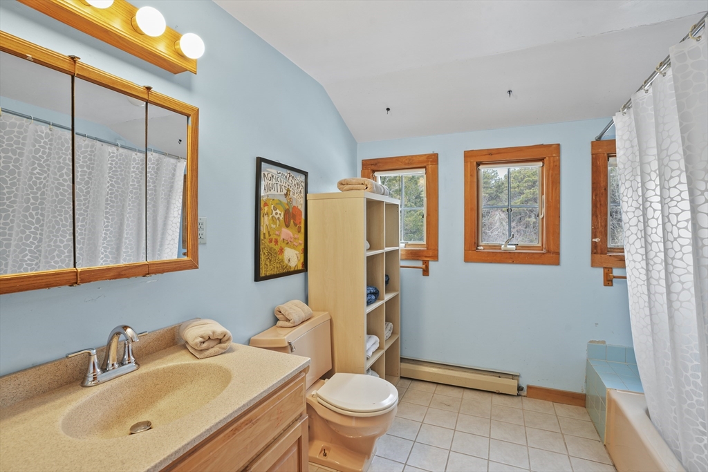 44 Planting Field Way Edgartown, MA 02539 - Photo 24 of 33 a bathroom with a sink toilet and shower