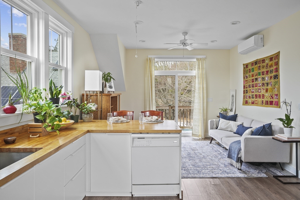 44 Planting Field Way Edgartown, MA 02539 - Photo 26 of 33 a living room with furniture and a large window