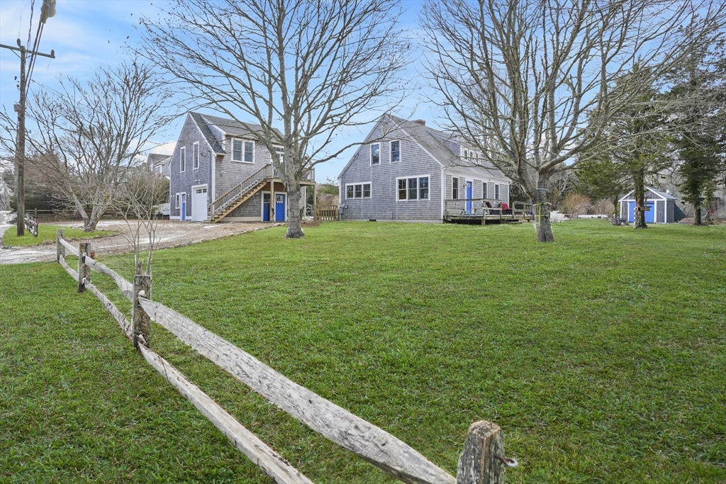 44 Planting Field Way Edgartown, MA 02539 - Photo 3 of 32 a front view of a house with a yard