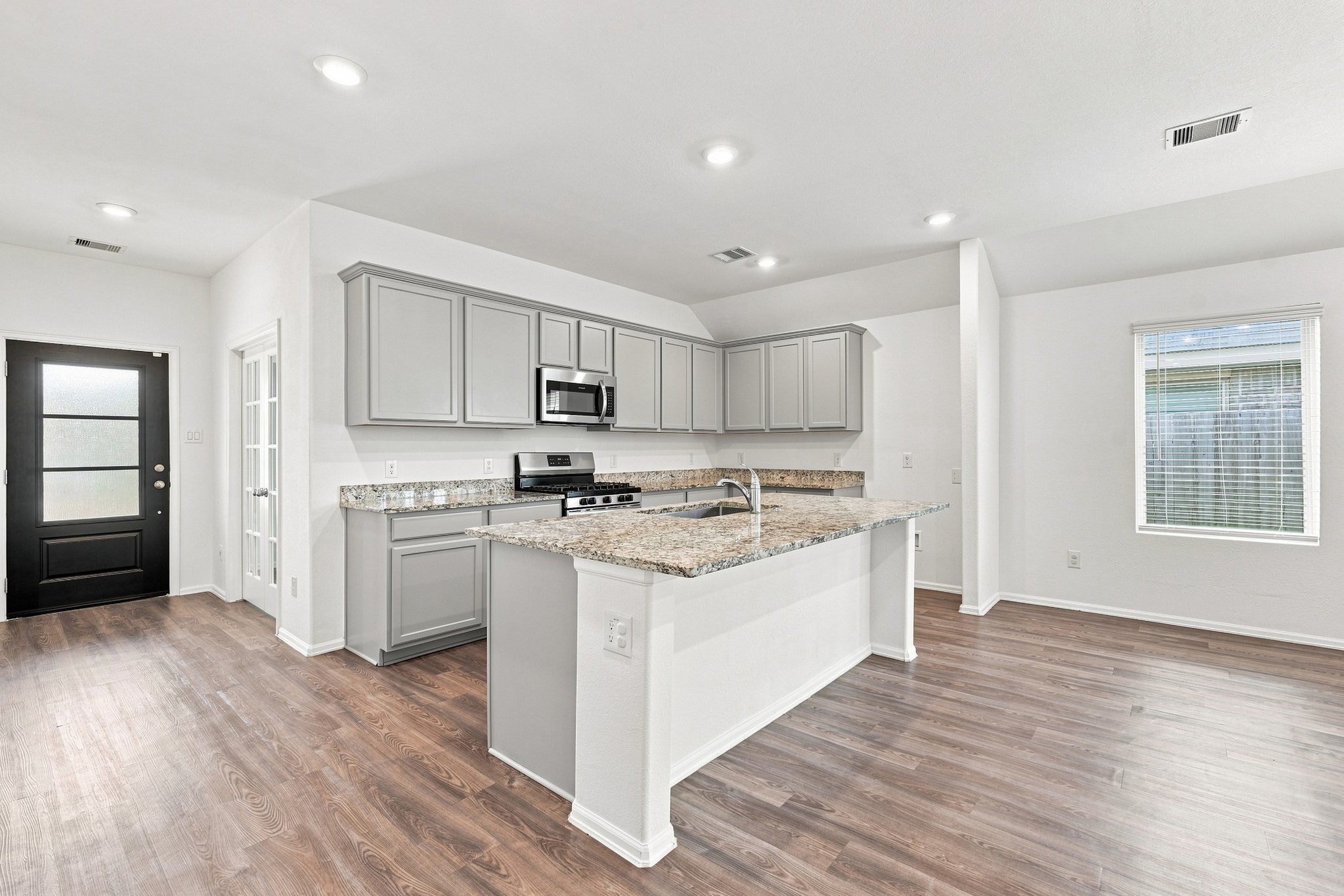 14222 Overbrook Willow Way Rosharon, TX 77583 - Photo 9 of 44 Kitchen open to Dinner are and Living rom