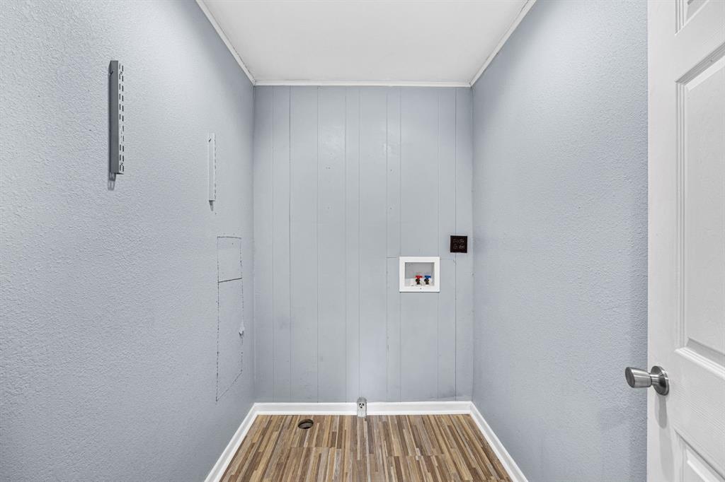 709 Sissom Road Killeen, TX 76541 - Photo 19 of 24 a view of small space with racks on the wall