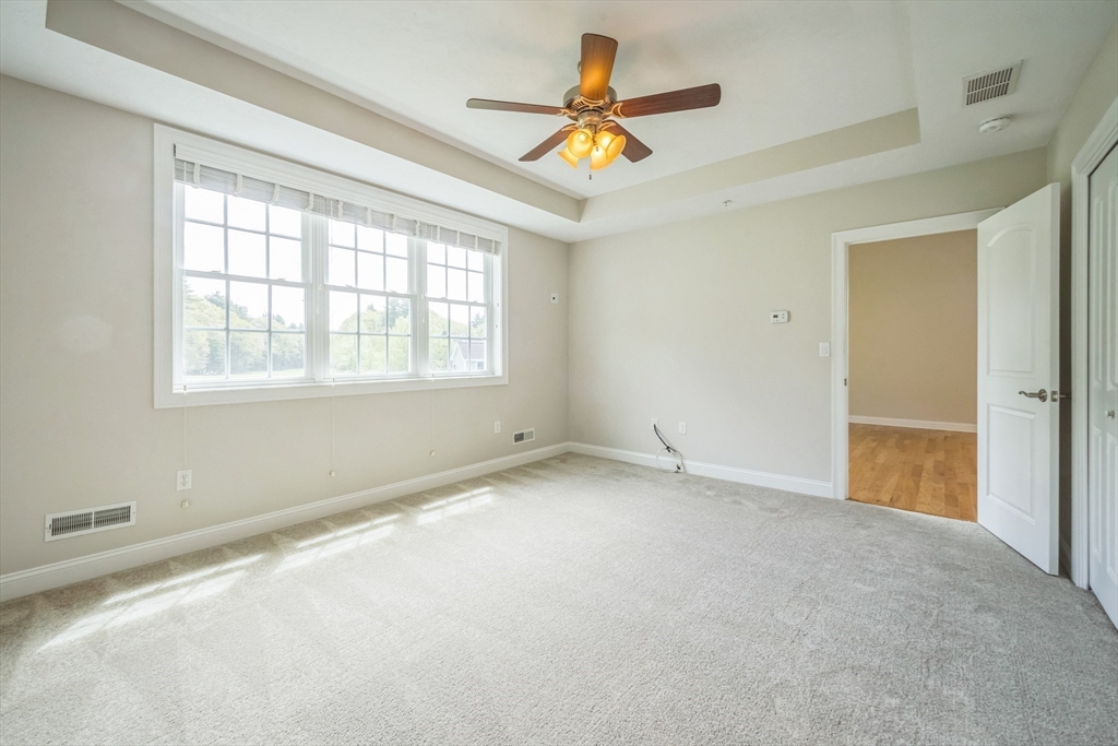 53 Baldwin Road, Unit 1401 Billerica, MA 01821 - Photo 22 of 32 a view of an empty room with a window