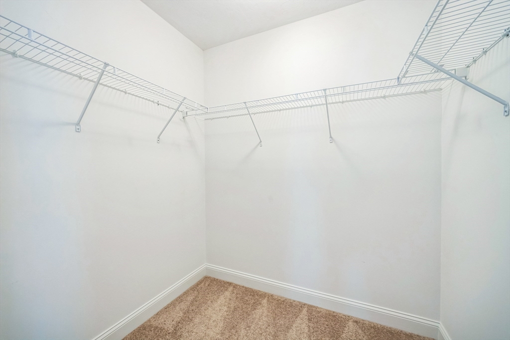 53 Baldwin Road, Unit 1401 Billerica, MA 01821 - Photo 26 of 32 a view of a rack on the wall
